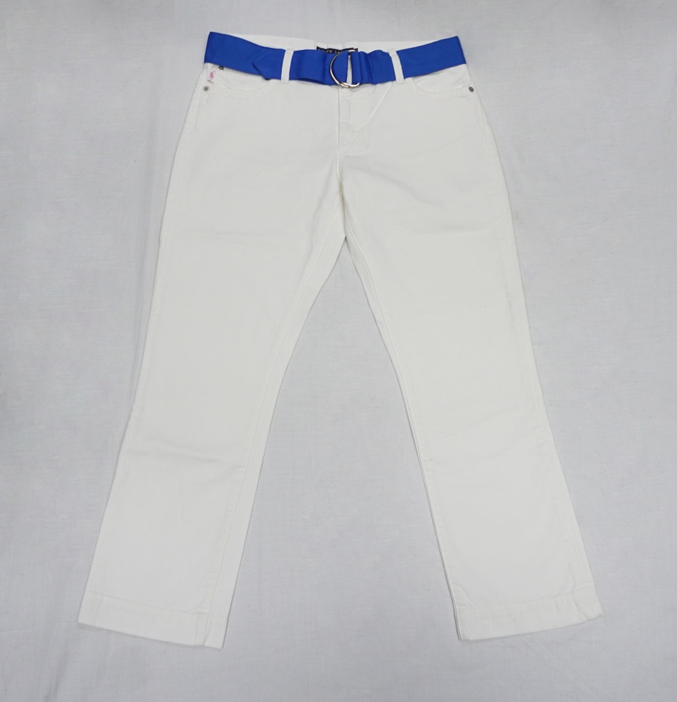 White chinos — blue belt